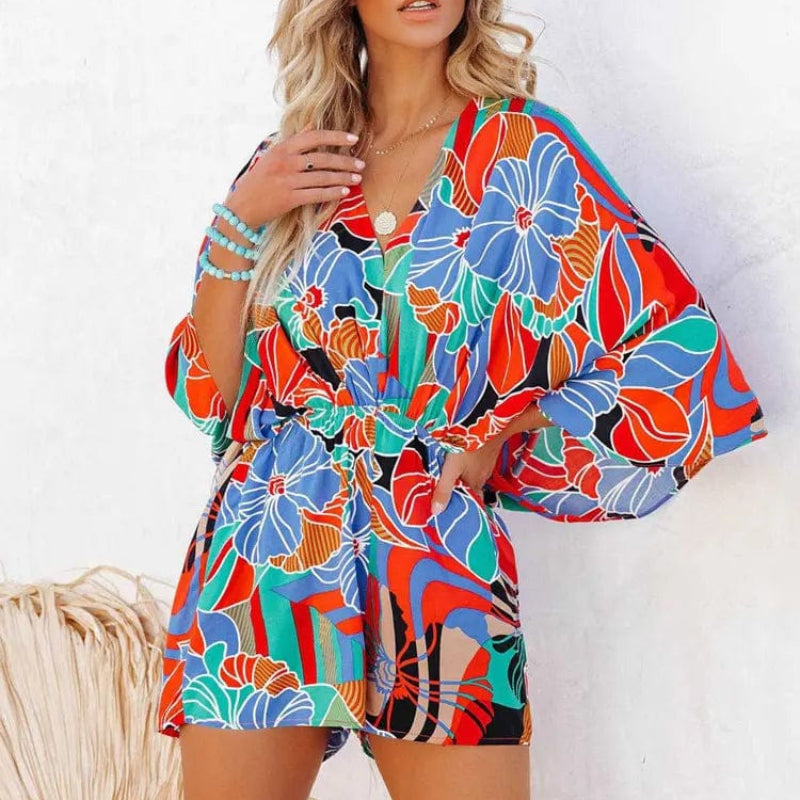 Women's floral print romper | Stylish v-neck summer outfit with wide leg shorts 2