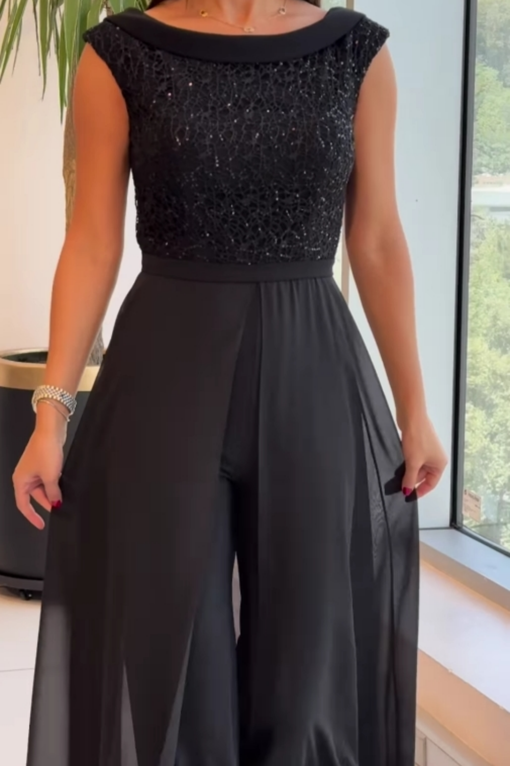 Women's textured black jumpsuit | Elegant sleeveless design for all occasions 3