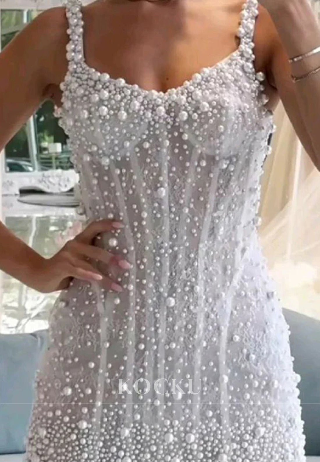 Women's elegant beaded mini wedding dress | Chic short gown with spaghetti straps and V-neckline 1
