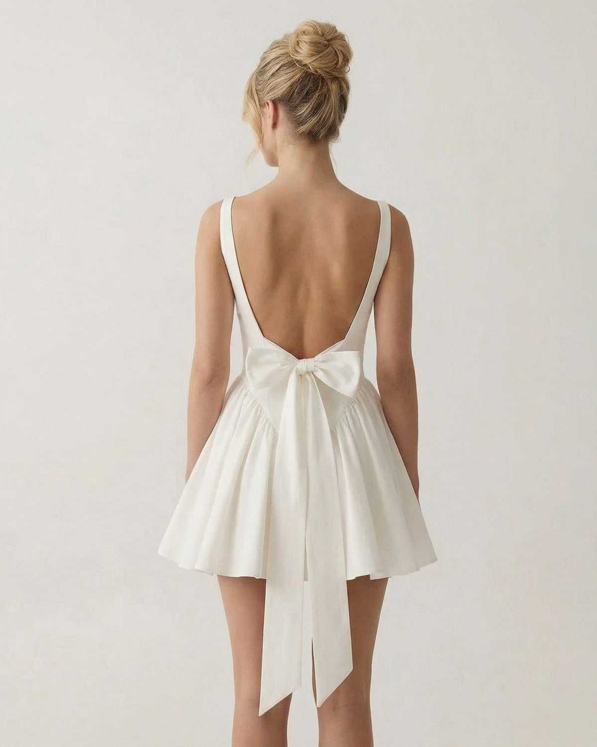 Women's elegant polyester mini dress | Backless white summer dress for cocktail occasions 0