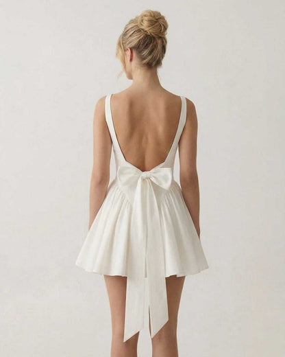 Women's elegant polyester mini dress | Backless white summer dress for cocktail occasions 0