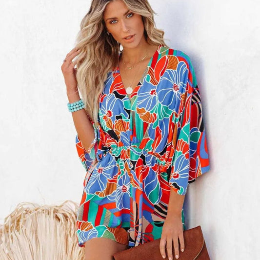 Women's floral print romper | Stylish v-neck summer outfit with wide leg shorts 0